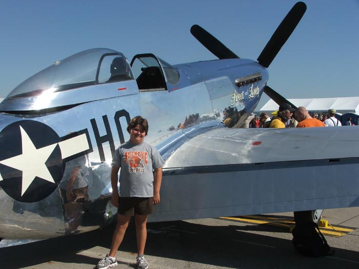 Sarah with a P-51 Mustang