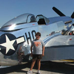 Sarah with a P-51 Mustang