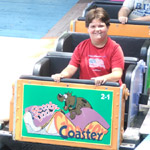 Sarah riding Scooby-Doo's Ghoster Coaster