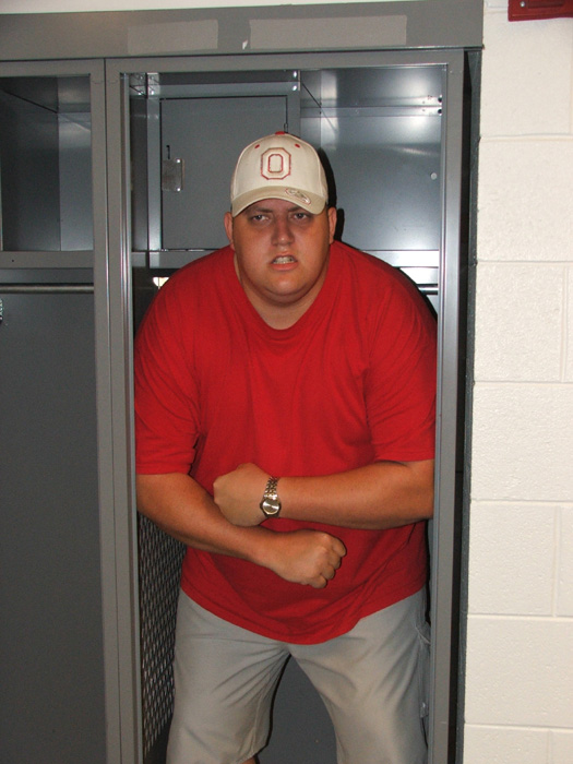 Derek in the visitor's locker room